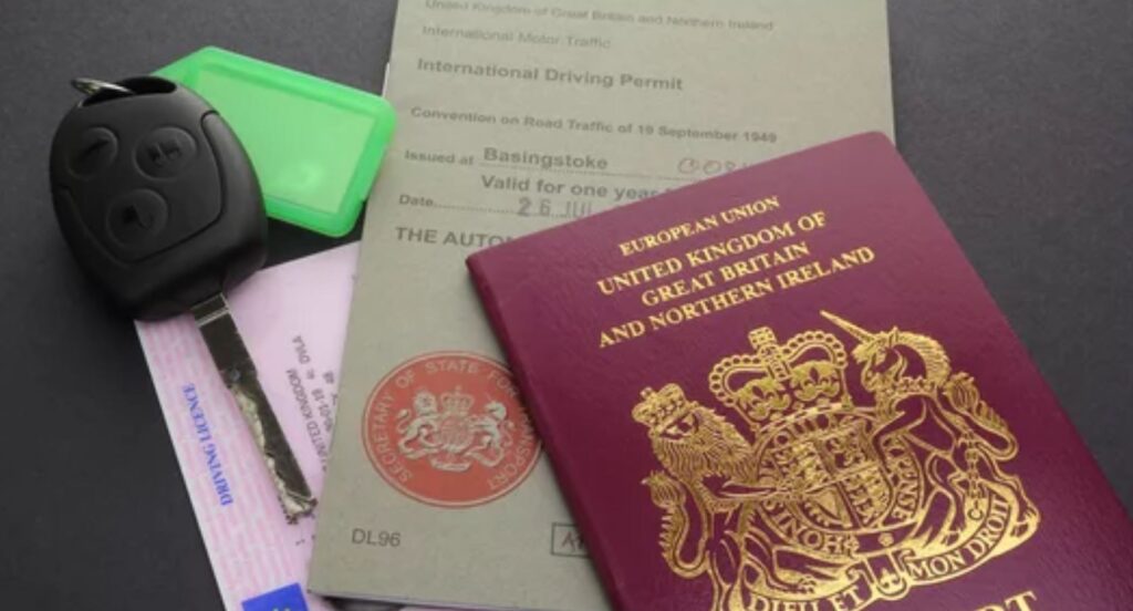 Passport, international driving permit, car key, and driving licence