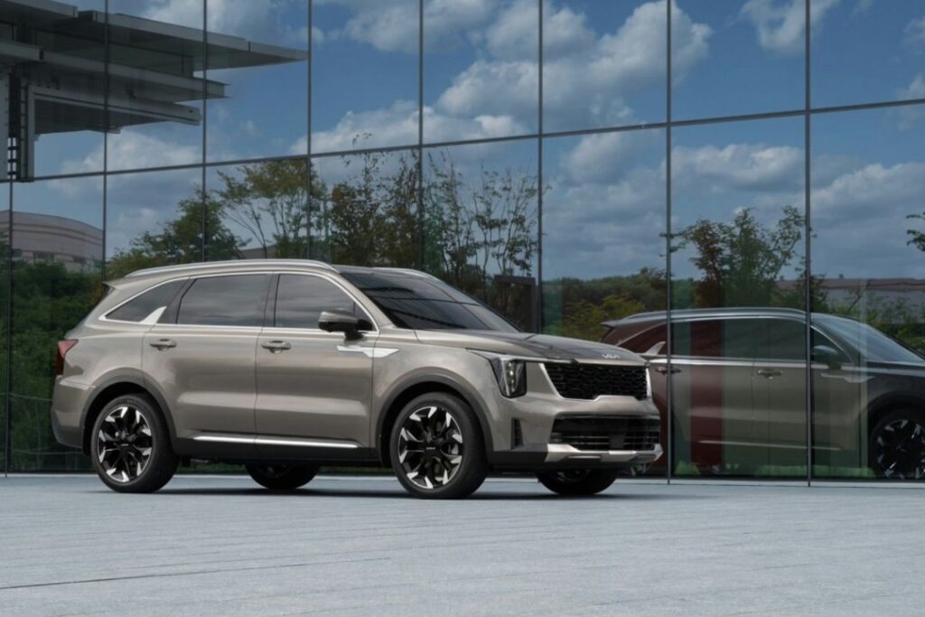 Kia Sorento outside a glass building