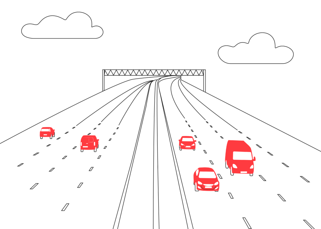 Cars driving along a motorway in the UK - drive in the UK with a foreign licence
